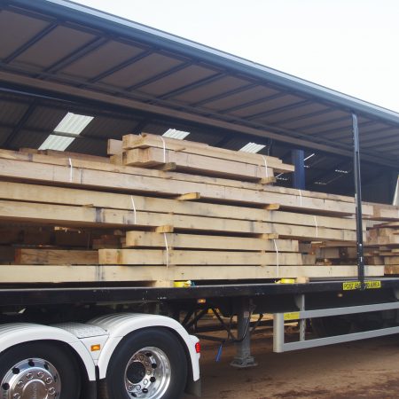 Fully loaded customer delivered beams in the back of our delivery lorry